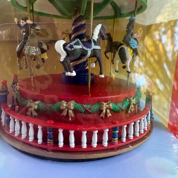 Animated Musical Carousel with Red and Green Accents - Picture 5 of 7